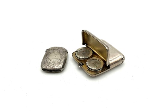 Lot 19 - Two silver vesta cases, together with a sovereign case