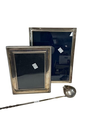 Lot 318 - Two silver photo frames, together with a...