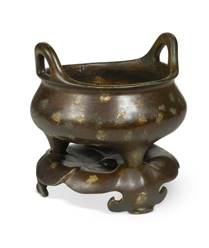 Lot 57 - A Chinese gold splash bronze tripod Ding censer and stand, cast Ming mark but 18th or 19th century