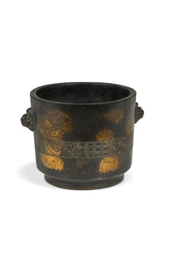 Lot 54 - A Chinese bronze gold splashed censer in archaic style, Qing Dynasty