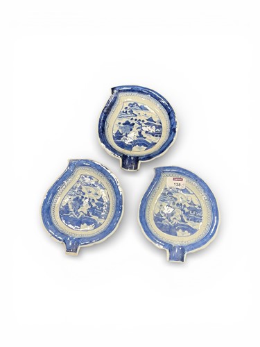 Lot 138 - Three 18th century blue and white leaf shaped...