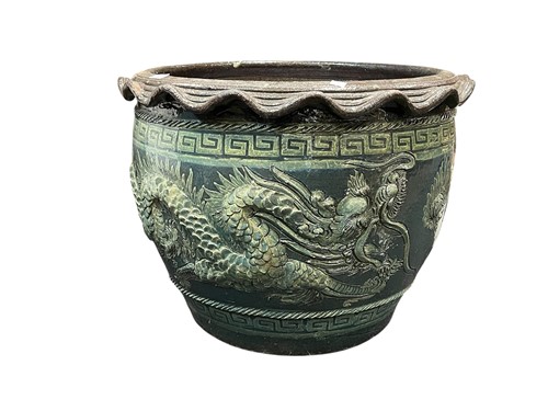 Lot 440 - A stoneware jardiniere in Chinese taste,...