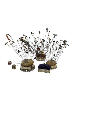 Lot 312 - A large collection of hat pins, including...