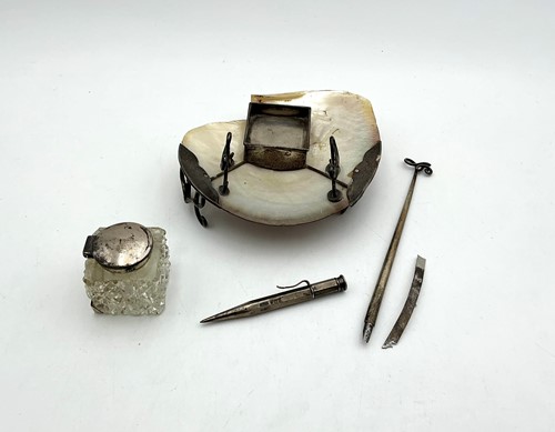 Lot 37 - An inkwell, together with a propelling pencil