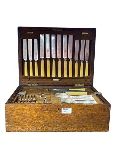 Lot 352 - An oak canteen of M & W Princes Plate flatware...