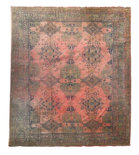 Lot 594 - A large Ushak carpet, circa 1940