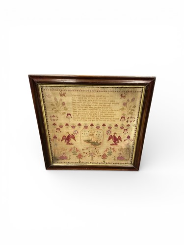 Lot 153 - A large framed needlework sampler, Mary...