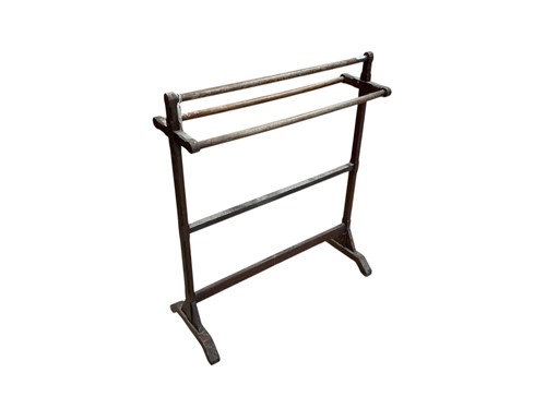 Lot 462 - An early 20th century oak towel rail or...