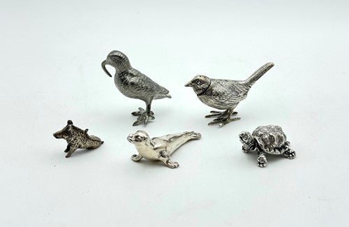 Lot 52 - A group of silver animals, together with a plated bird