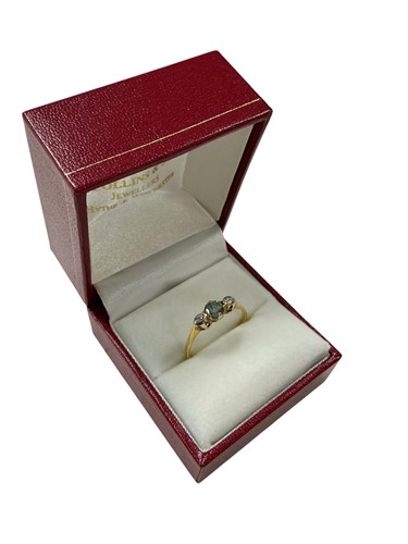 Lot 355 - A zircon and diamond three stone ring,...