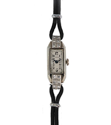 Lot 251 - Eszeha - An Art Deco diamond set cocktail wristwatch