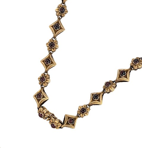 Lot 39 - An early Victorian red paste cabochon floral necklace