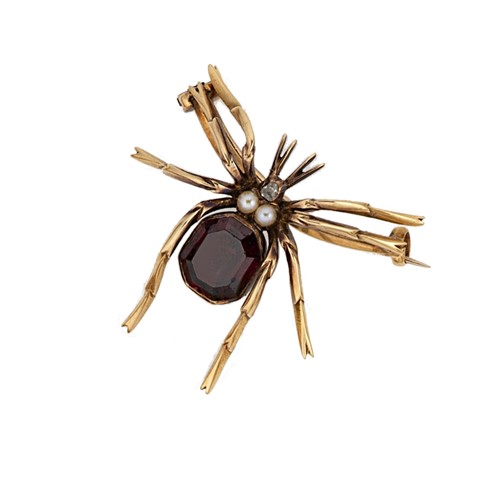 Lot 35 - A Victorian garnet, pearl and diamond spider brooch