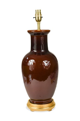 Lot 576 - A sang-de-boeuf glazed ceramic lamp, 20th century