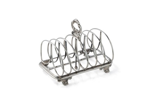Lot 349 - A William IV silver six division toast rack