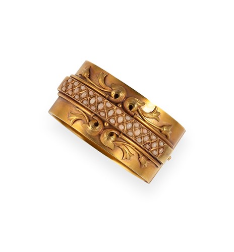 Lot 20 - A late Victorian coral hinged bangle