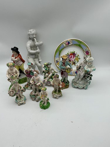 Lot 80 - A collection of porcelain and pottery figures