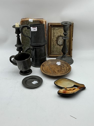Lot 136 - Two pewter candlesticks, three pewter tankards,...