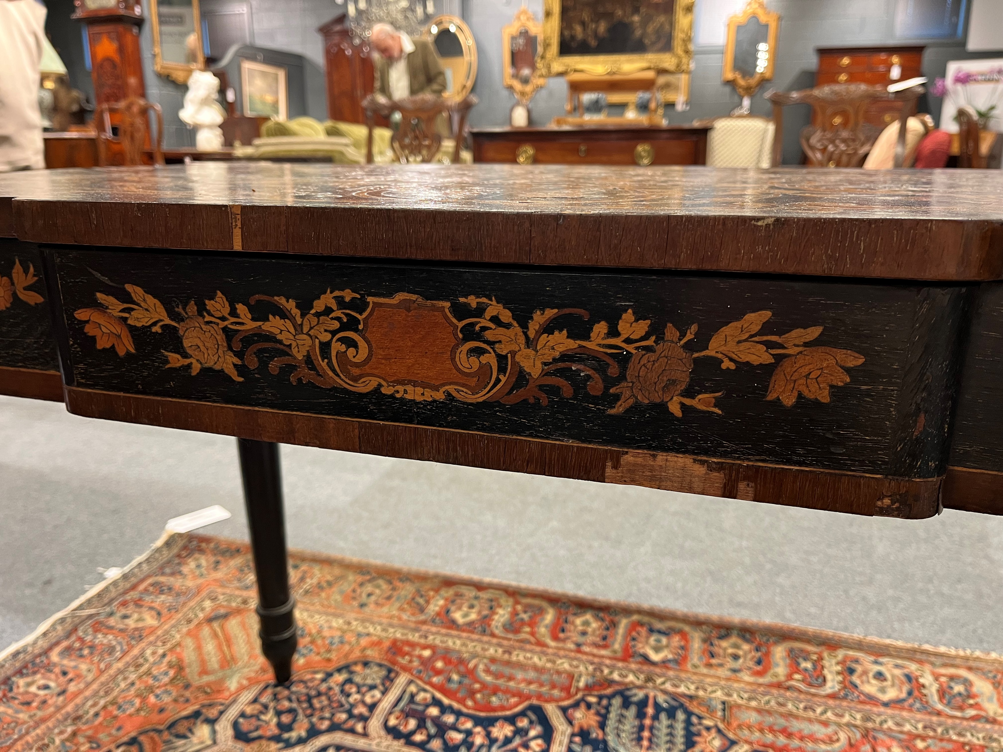 Lot 710 - An ebonised and marquetry inlaid centre