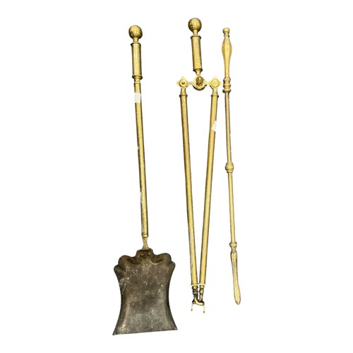 Lot 783A - A collection of brass fire irons