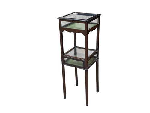 Lot 689 - A mahogany two tier glazed bijouterie table,...