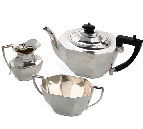 Lot 413 - A George V silver three piece tea set