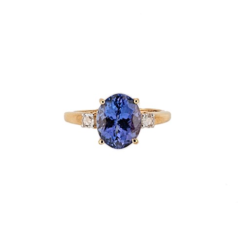 Lot 148 - An 18ct gold tanzanite and diamond ring