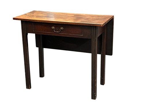 Lot 687 - A George III mahogany side table with drop flap