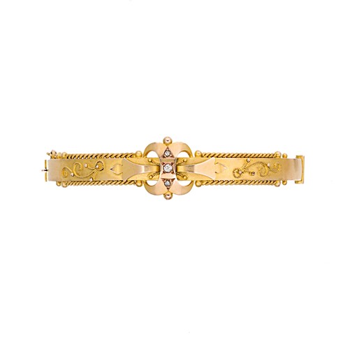 Lot 47 - An Edwardian diamond set bangle