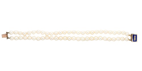 Lot 40 - A double row cultured pearl bracelet with enamel clasp