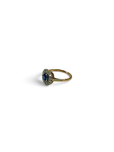 Lot 344 - A synthetic sapphire and diamond cluster ring,...
