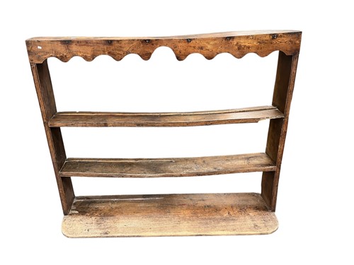 Lot 615 - An elm dresser-shelf, 18th century, 108 x 129...