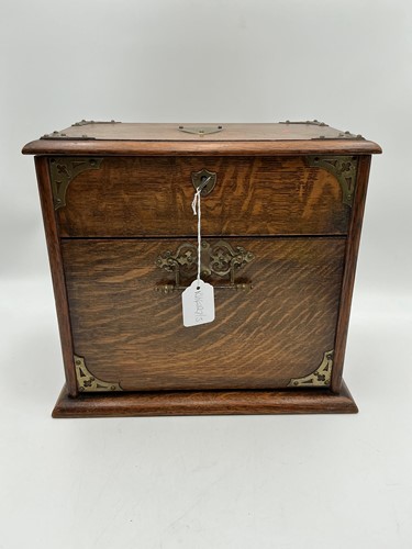 Lot 127 - A late Victorian oak and brass bound wooden...