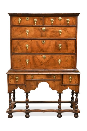 Lot 390 - A Queen Anne walnut chest on stand