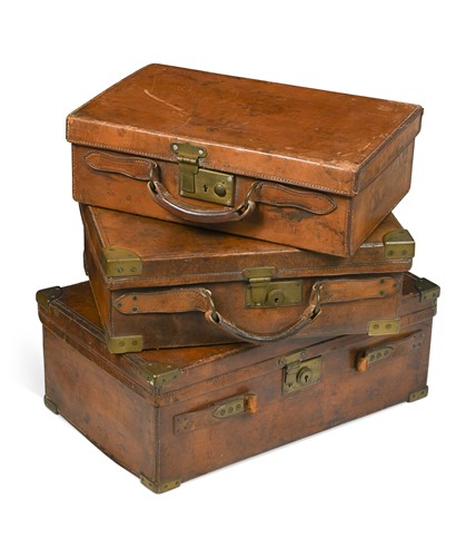 Lot 660 - An oak and leather cartridge magazine