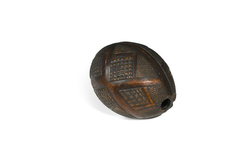 Lot 515 - A carved coconut 'Bugbear' flask