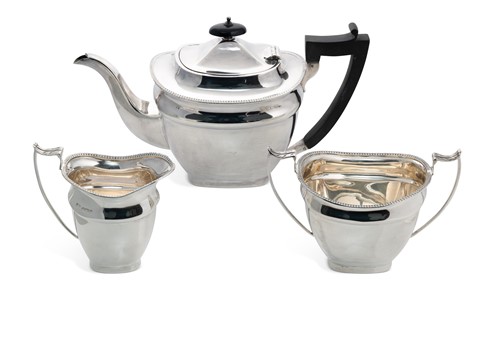 Lot 412 - A George V three-piece silver tea service