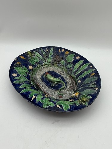 Lot 13 - A Palissy oval dish, the centre applied with a...