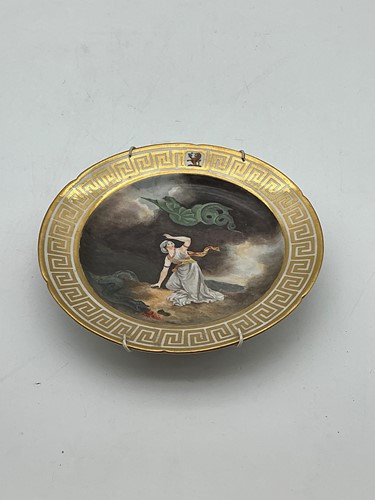 Lot 41 - A Coalport armorial plate, decorated with a...