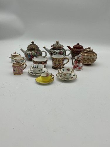 Lot 53 - A group of miniature ceramics, to include a...