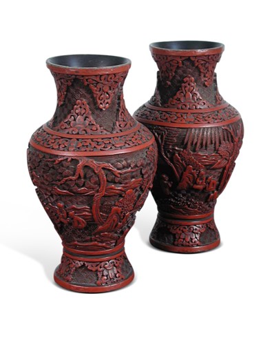 Lot 60 - A pair of late 19th/early 20th century cinnabar lacquer vases