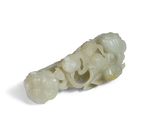 Lot 65 - A nephrite jade lotus group.