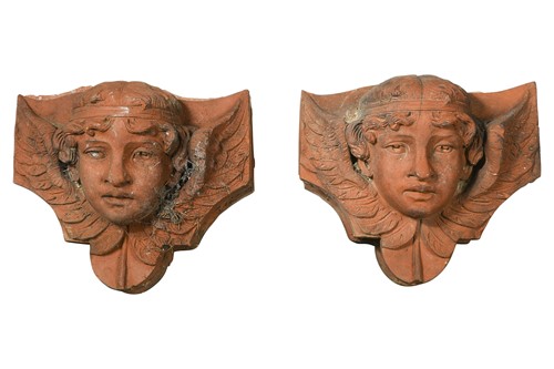 Lot 707 - A pair of terracotta architectural reliefs, 20th century
