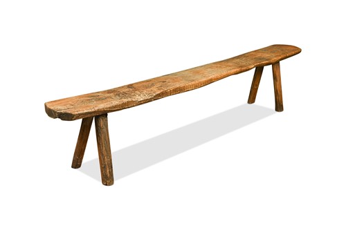 Lot 315 - A provincial elm pig bench, 19th century