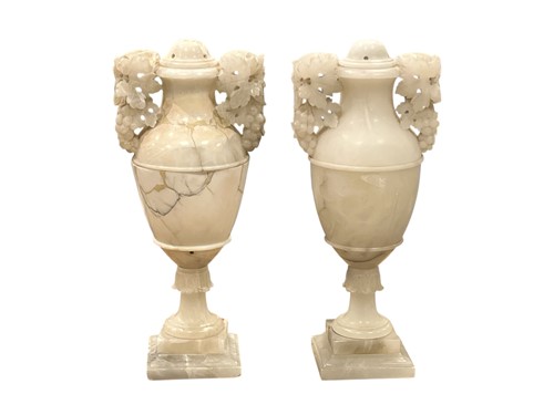 Lot 701 - A pair of alabaster urns, 20th century, now...