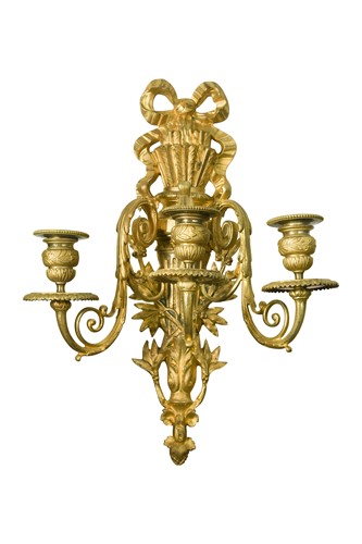 Lot 464 - A pair of gilt metal three branch neoclassical style wall sconces