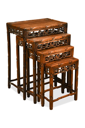 Lot 530 - A Chinese nest of four hardwood tables, late 19th century