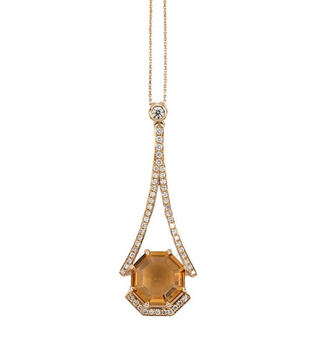Lot 29 - A citrine and diamond pendant and chain