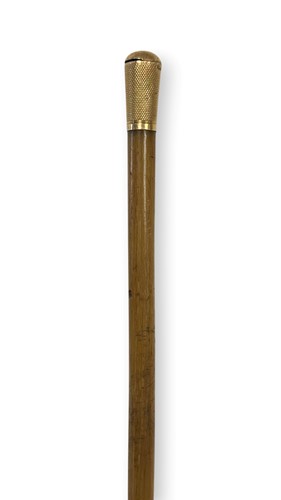 Lot 47 - A gold mounted rhino horn riding crop