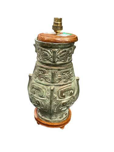 Lot 315 - A Han dynasty style archaic bronze lamp